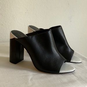 Kate Spade black and white leather mules